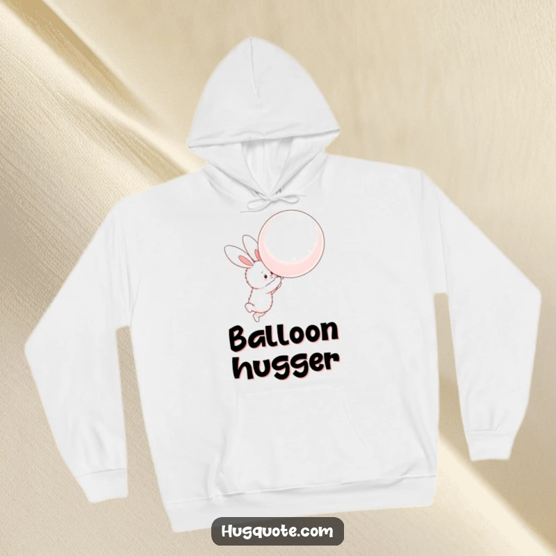 Funny hoodie with a fluffy bunny character reaching for a giant balloon, offering cozy comfort and whimsical charm.